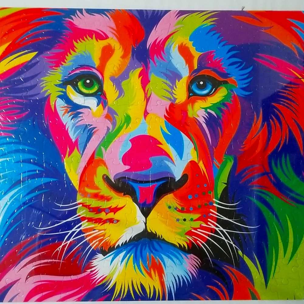 I'm selling a tie die Lion puzzle it is already made